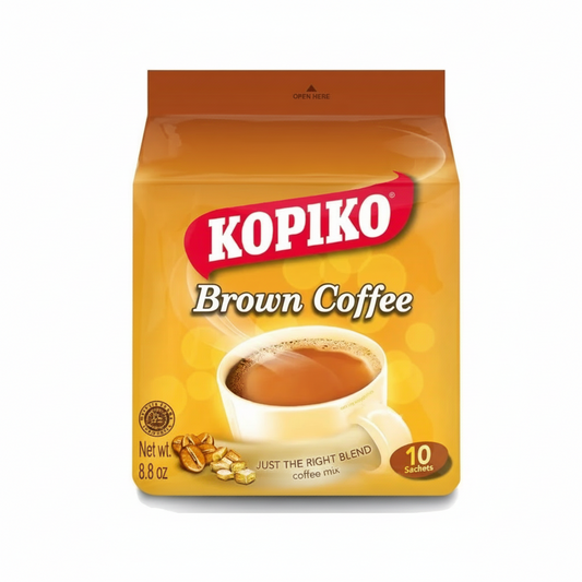 Kopiko Brown Coffee package with a cup of coffee on a white background