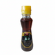 Bottle of roasted sesame oil with a yellow cap on a white background