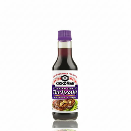 Kikkoman Roasted Garlic Teriyaki sauce bottle on a white background
