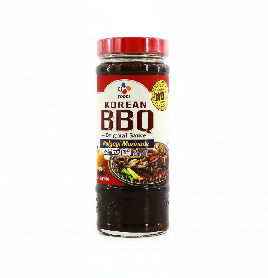 Korean BBQ sauce bottle with red lid on a white background