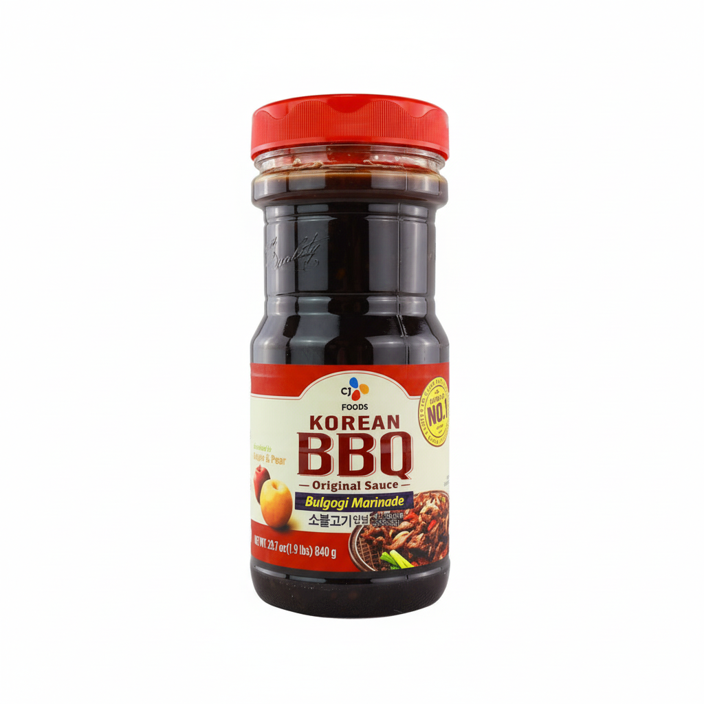 Korean BBQ sauce bottle with red cap on a white background
