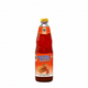 Bottle of sweetened chili sauce with a red label on a white background